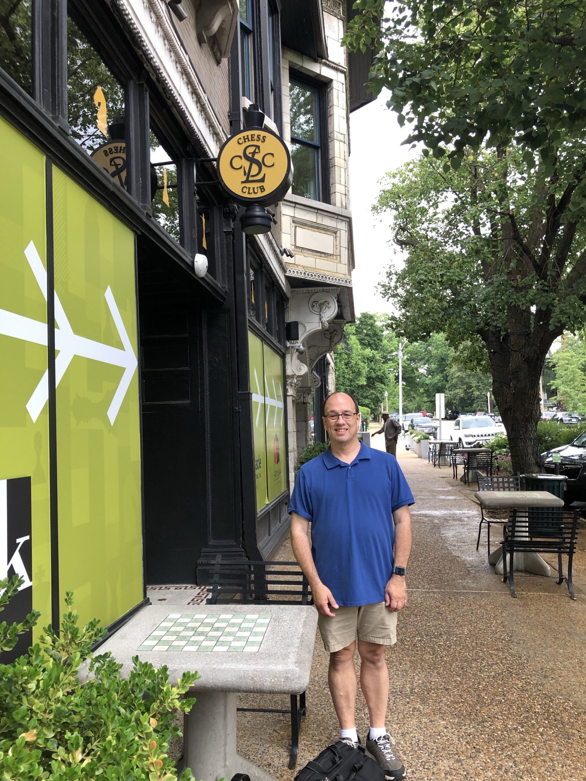 Standing at the St. Louis Chess Center.